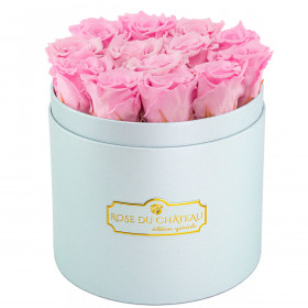 Rose eterne rosa pallido in flowerbox azzurro